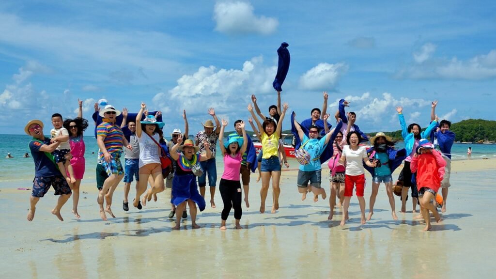 a group of people by the beach showing travel and tour packages 